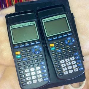 2 working texas instruments TI-83 plus calculators